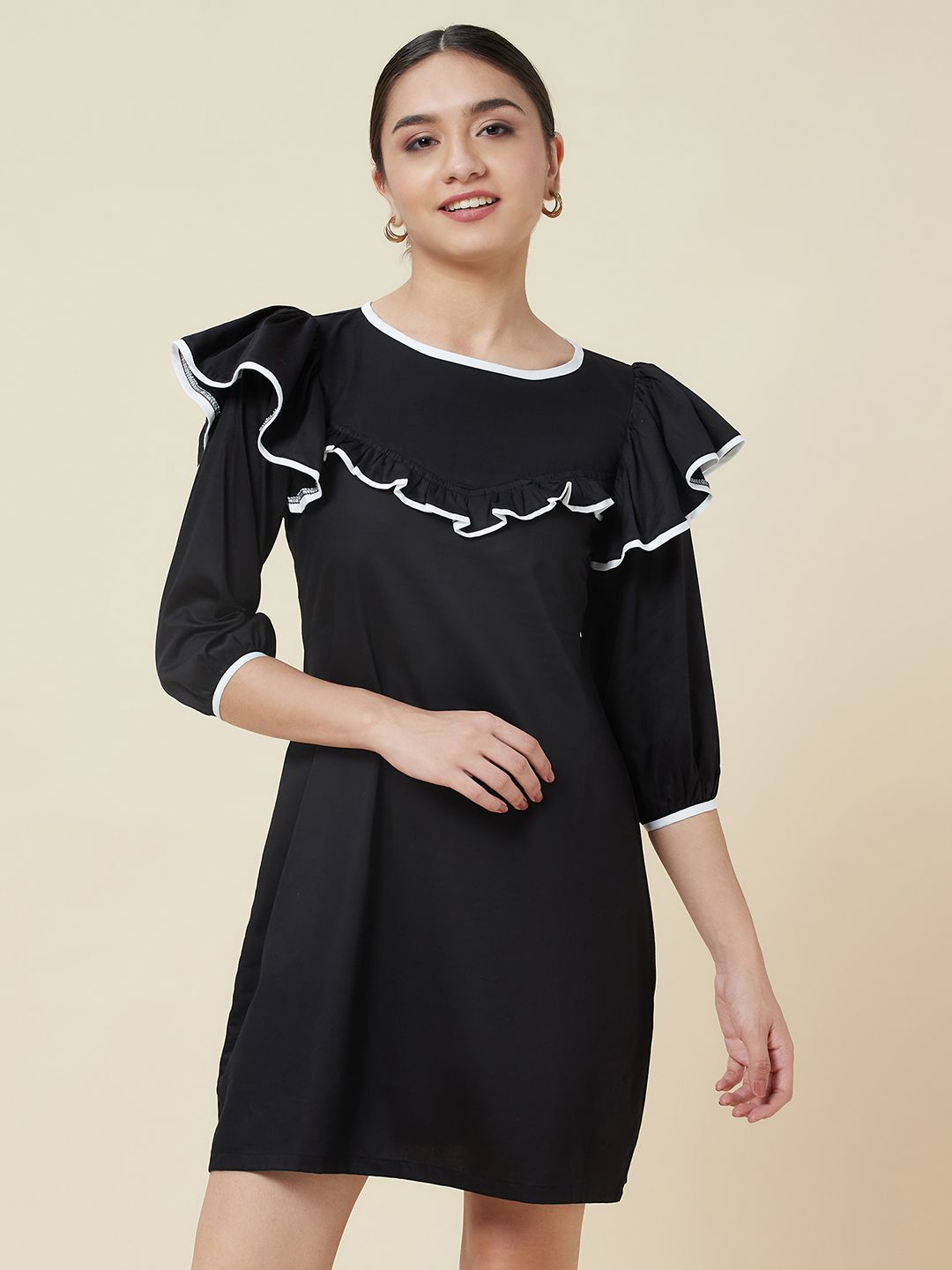 Black a-line frill neck dress with white piping detailing