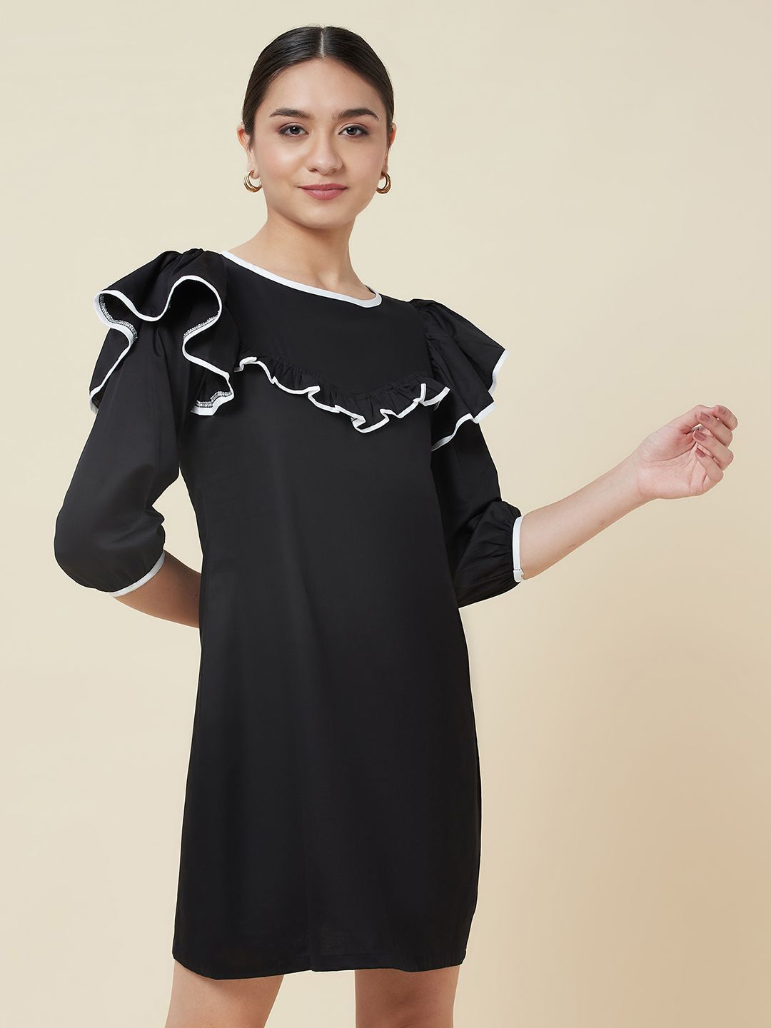 Black a-line frill neck dress with white piping detailing