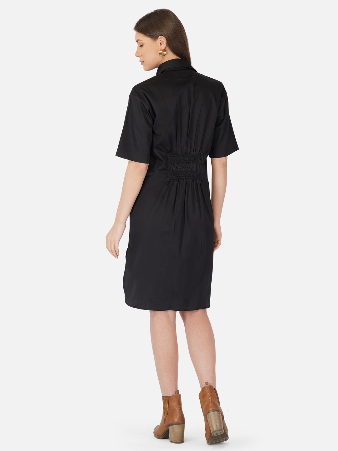 Black shirt dress with brown patchpockets and smocking at the back