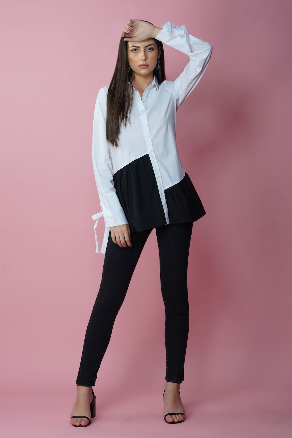 White shirt with black peplum detail