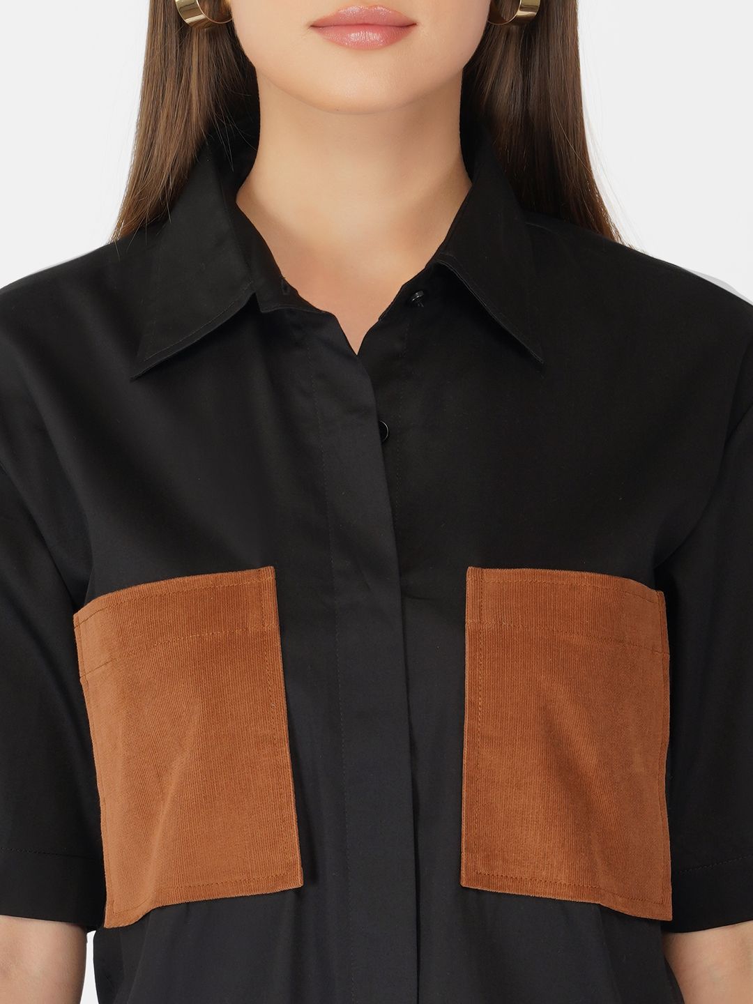 Black shirt dress with brown patchpockets and smocking at the back