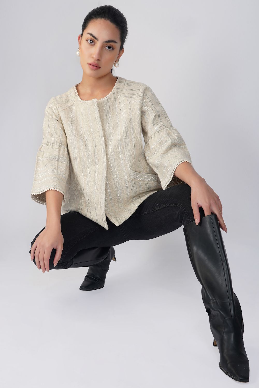 Beige jacket with bell sleeves