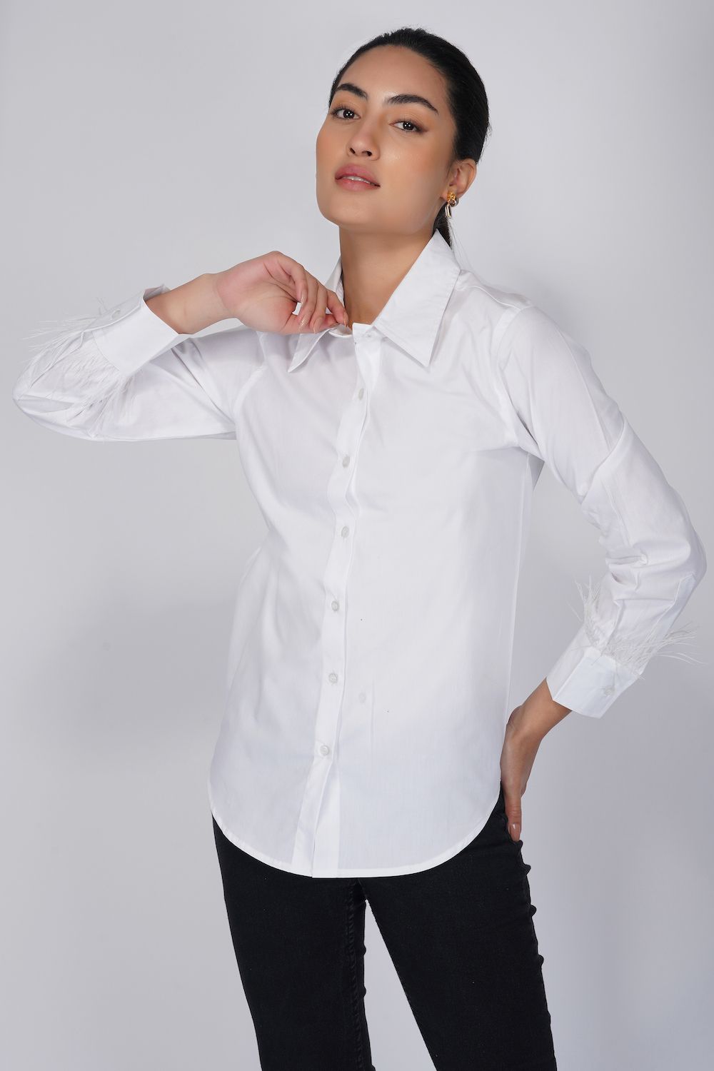 White shirt with faux feather sleeves