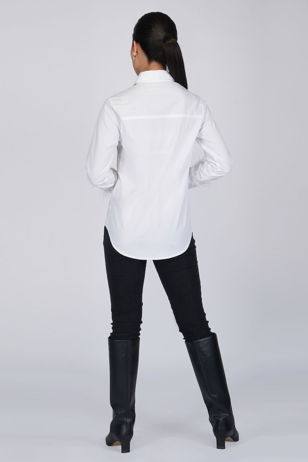 White shirt with faux feather sleeves