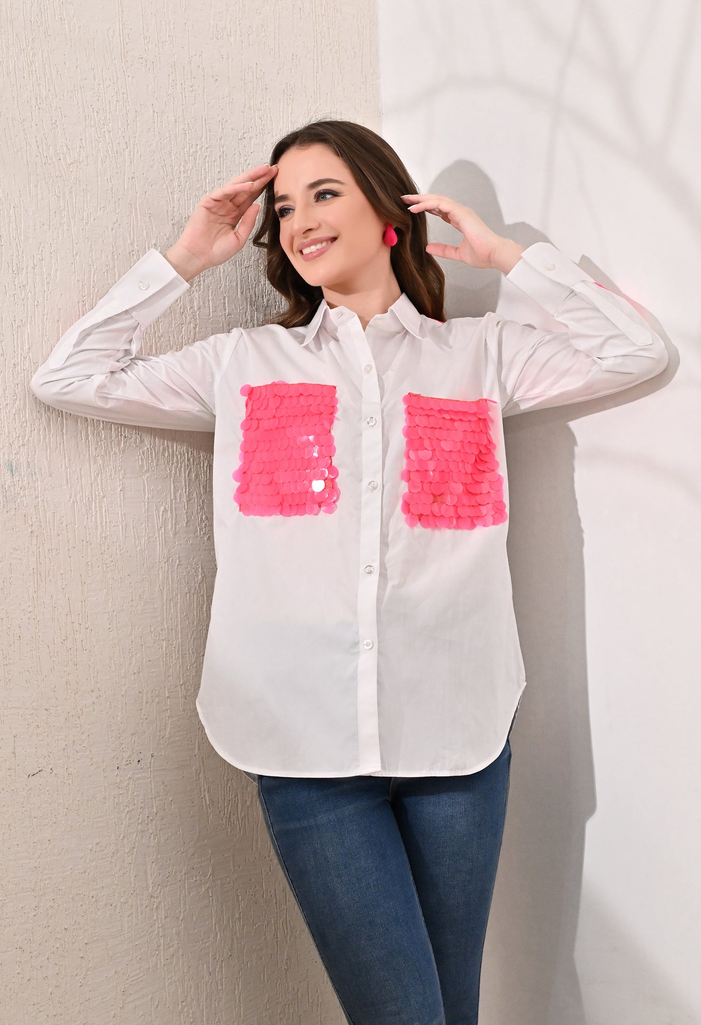 White shirt with neon pink sequence patch pockets