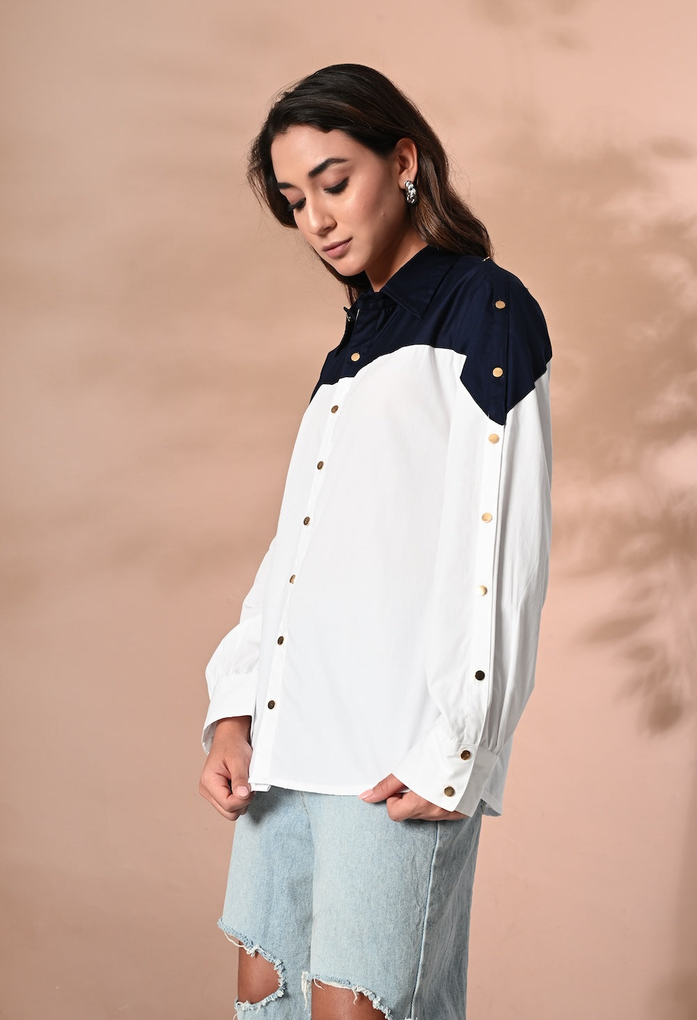 Navy blue and white shirt with golden buttons