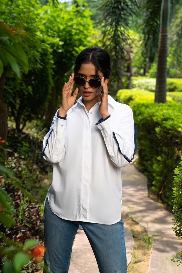 White shirt with denim fringes on sleeves